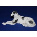 Goldscheider model of reclining Borzoi hound, impressed No. 6730, 17cm high.