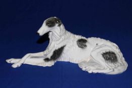 Goldscheider model of reclining Borzoi hound, impressed No. 6730, 17cm high.