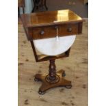 Victorian mahogany sewing table having frieze drawer on turned pedestal to inverted quadriform base,
