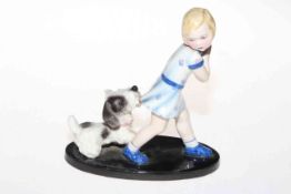 Goldscheider figure of girl playing with dog, impressed No. 6853, 16cm high.