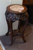 Chinese marble inset and carved rosewood jardiniere stand, 60cm by 31cm diameter.