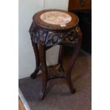 Chinese marble inset and carved rosewood jardiniere stand, 60cm by 31cm diameter.