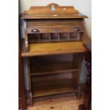 Early 20th Century oak roll top bureau open bookcase, 115cm by 71cm.
