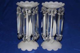 Pair frosted glass lustres with crystal drops.