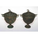 Pair antique metal urns and covers with relief vine decoration, 16cm.