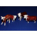 Two Beswick Hereford bulls, 'Ch. of Champions' 1363A and 2549, cow 1360 and calf 901B (4).
