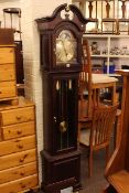 Modern triple weight longcase clock with moon phase dial.
