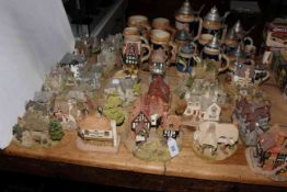 Thirty Lilliput Lane figures and eighteen beer steins.