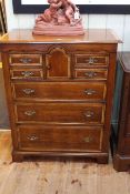 Good quality oak and satinwood banded chest having arched central cupboard door flanked by four