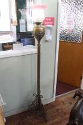 Brass reeded column standard oil lamp with etched glass shade, height 167cm.