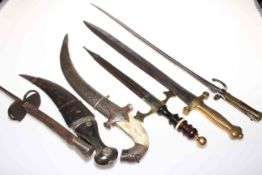 Collection of six swords, daggers and bayonet.