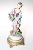 Capodimonte lady on gilt four footed mount, 30cm.