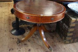 Mahogany leather inset topped revolving drum table having three drawers and five faux drawers on