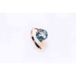 9 carat gold ring set with aquamarine coloured stone, size O.