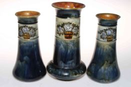 Garniture of three Royal Doulton stoneware vases, each having band of roses in tubs,