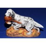 Royal Doulton model of an English setter carrying a pheasant, HN 2529, designed by Frederick Daws.