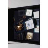 Collection of gold jewellery including rings, necklaces and brooch.