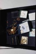 Collection of gold jewellery including rings, necklaces and brooch.