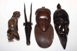 Pair African carved wall masks, carved figure and antelope.