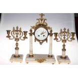 Gilt metal and marble three piece clock garniture with floral design enamel dial,