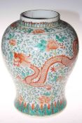 Chinese famille verte ovoid vase decorated with exotic birds, 36cm high.