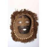 Ugandan tortoiseshell tribal mask.