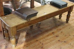 Waxed pine bench on turned legs, 45cm by 156cm.