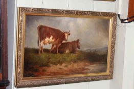 After T.S. Cooper, oil on canvas of Cows at Waters Edge, 30cm by 50cm, modern frame.