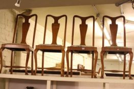 Set of four oak Queen Anne style dining chairs.