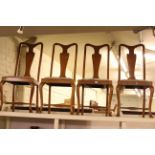 Set of four oak Queen Anne style dining chairs.