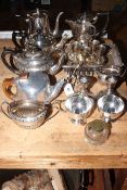 Collection of silver plated teapots, jugs, candlesticks, toast rack, etc.
