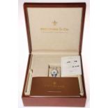 Lady's Dreyfuss watch with certificate of authenticity in box.