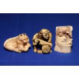 Three Japanese netsuke of woodcutter, mouse and tiger.