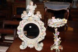 Continental cherub and floral encrusted table mirror and Continental cherub and floral centre-piece.