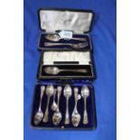Cased silver teaspoons, christening spoon and fork, spoon, and pair salt spoons.