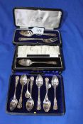 Cased silver teaspoons, christening spoon and fork, spoon, and pair salt spoons.