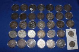 Collection of early and Victorian silver capsulated coins from 1804 to 1937,