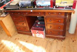 Victorian mahogany nine drawer pedestal desk with pitch pine top, 80cm by 152cm.