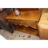 Period style three drawer oak potboard dresser, 76.5cm by 118cm.