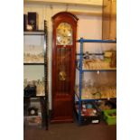 Modern triple weight longcase clock.