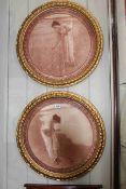 Pair circular Edwardian prints of Young Ladies, in gilt glazed frames, 50cm diameter.