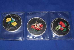 Three 1995 Twenty Five Crown 6.3cm Turks and Caiscos Islands coloured silver proof coins.