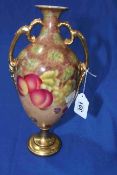 Fruit painted two handled vase, 27cm.