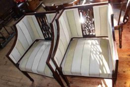 Pair Edwardian mahogany occasional chairs in striped fabric.