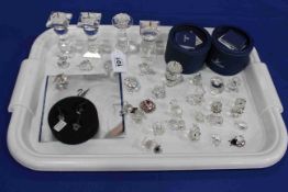 Collection of over thirty Swarovski miniatures and candlesticks.