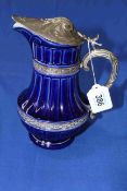 Royal Doulton blue glazed jug with silver plated mounts.