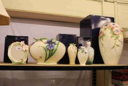 Seven Franz china pieces including Pansy vase, Iris small vase, Lilly photograph frame,