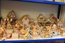 Shelf collection of Pendelfin Village and Pendelfin ornaments, approximately eight five.