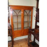 Edwardian painted satinwood two door vitrine on square tapering legs, 168cm by 99cm.