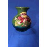 Small Moorcroft baluster vase.